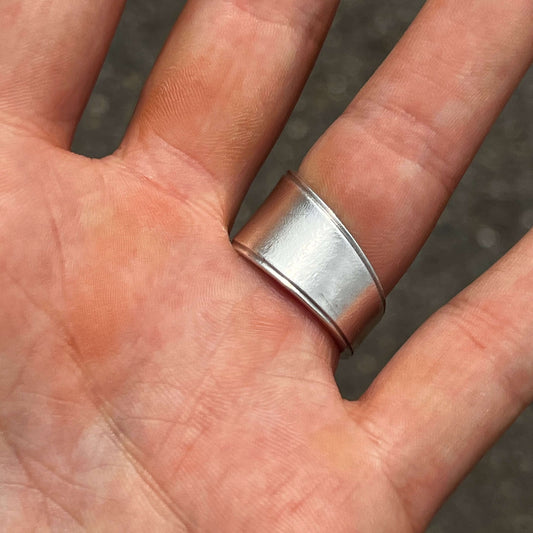 handcrafted silver spoon ring made from antique cutlery on hand