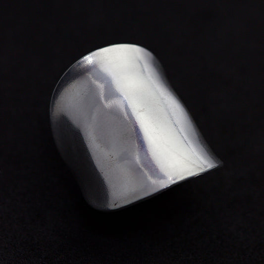 Silver ring on a black background